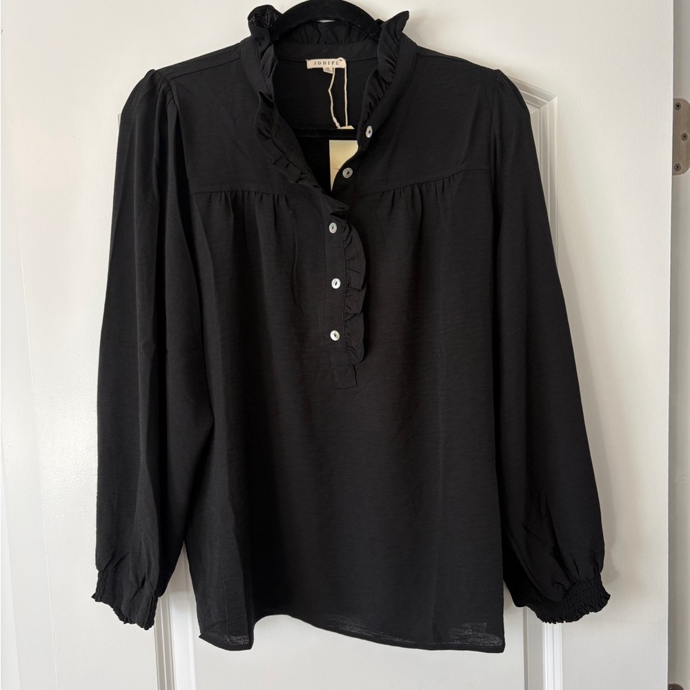 Women’s NWT Jodifl Black long sleeve shirt with button ruffled neckline. M. $35